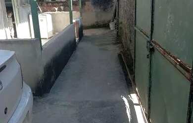 Imagem: A casa possui 3 Dormitórios, 2 Banheiros, 1 Vaga na garagem