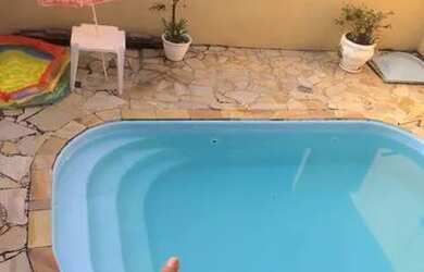 Imagem: A casa possui 5 Dormitórios, 4 Banheiros, 3 Vagas na garagem