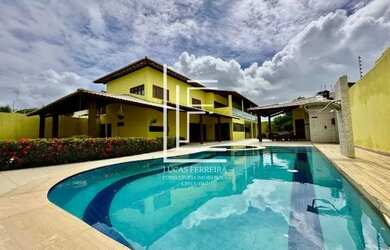 Imagem: A casa possui 5 Dormitórios, 5 Banheiros, 5 Vagas na garagem