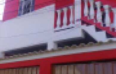 Imagem: A casa possui 2 Dormitórios, 1 Vaga na garagem, 60m² de Área