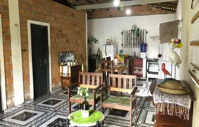 Imagem: A casa possui 2 Dormitórios, 1 Vaga na garagem e está localizado