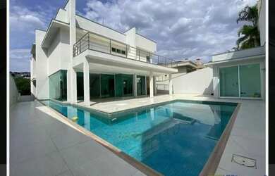 Imagem: A casa para alugar possui 4 Dormitórios, 5 Banheiros, 5 Vagas