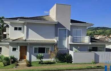 Imagem: A casa em condomínio possui 3 Dormitórios, 4 Banheiros, 4