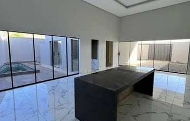 Imagem: A casa possui 3 Dormitórios, 3 Banheiros, 4 Vagas na garagem