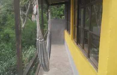 Imagem: A casa possui 2 Dormitórios, 1 Banheiro e está localizado