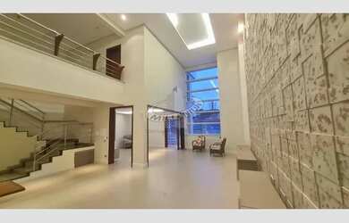 Imagem: A casa possui 3 Dormitórios, 4 Banheiros, 5 Vagas na garagem