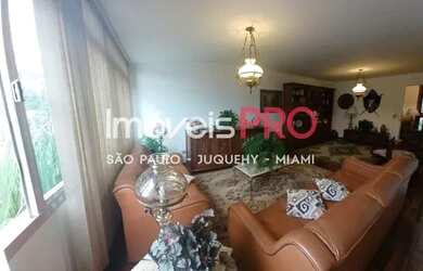 Imagem: A casa possui 4 Dormitórios, 5 Banheiros, 5 Vagas na garagem