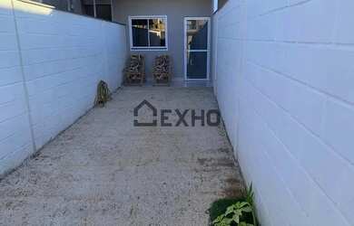 Imagem: A casa possui 2 Dormitórios, 1 Banheiro, 2 Vagas na garagem