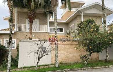 Imagem: A casa em condomínio possui 4 Dormitórios, 5 Banheiros, 4