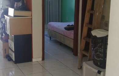 Imagem: A casa possui 2 Dormitórios, 1 Banheiro, 1 Vaga na garagem