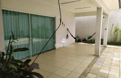 Imagem: A casa possui 4 Dormitórios, 3 Banheiros, 4 Vagas na garagem