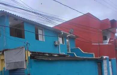 Imagem: A casa possui 3 Dormitórios, 1 Banheiro e está localizado