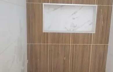 Imagem: A casa possui 2 Dormitórios, 2 Banheiros e 1 Vaga na garagem