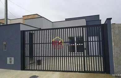 Imagem: A casa possui 3 Dormitórios, 2 Banheiros, 2 Vagas na garagem