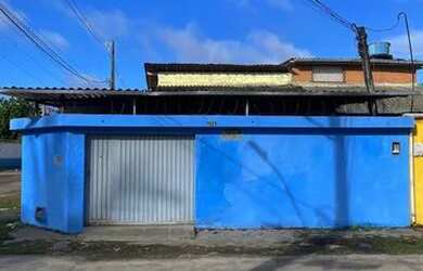 Imagem: A casa possui 3 Dormitórios, 3 Banheiros, 4 Vagas na garagem