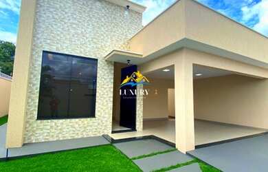 Imagem: A casa possui 3 Dormitórios, 3 Banheiros, 4 Vagas na garagem