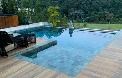 Imagem: A casa em condomínio possui 5 Dormitórios, 5 Banheiros, 4