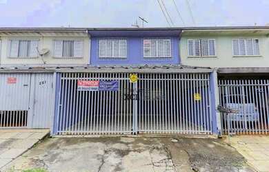 Imagem: A casa possui 3 Dormitórios, 2 Banheiros, 2 Vagas na garagem