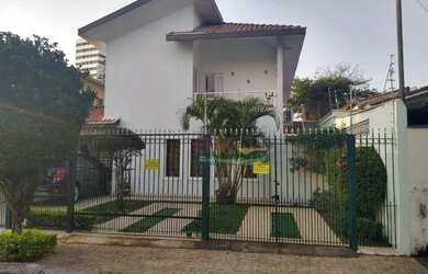 Imagem: A casa possui 5 Dormitórios, 4 Banheiros, 3 Vagas na garagem