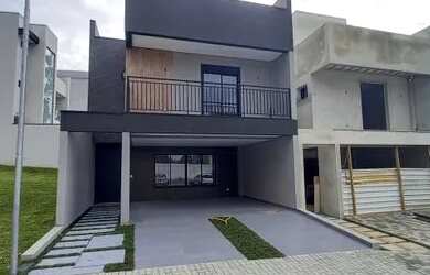 Imagem: A casa possui 3 Dormitórios, 4 Banheiros, 4 Vagas na garagem