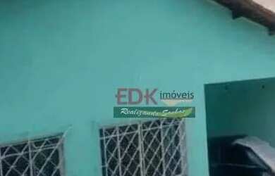 Imagem: A casa possui 4 Dormitórios, 2 Banheiros, 1 Vaga na garagem