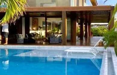 Imagem: A casa em condomínio possui 5 Dormitórios, 5 Banheiros, 2