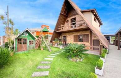 Imagem: A casa possui 3 Dormitórios, 3 Banheiros, 160m² de Área e