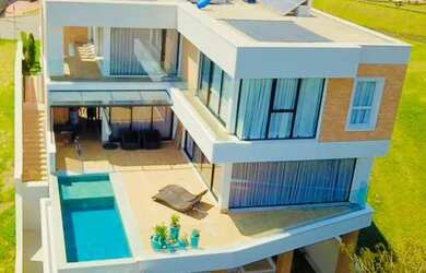 Imagem: A casa em condomínio possui 4 Dormitórios, 5 Banheiros, 4