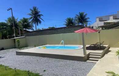 Imagem: A casa possui 4 Dormitórios e 5 Vagas na garagem e está localizado