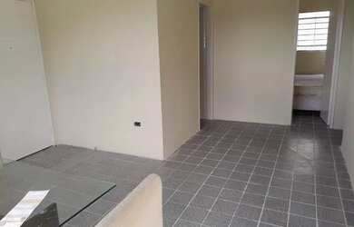 Imagem: O apartamento possui 3 Dormitórios, 1 Banheiro, 1 Vaga na garagem