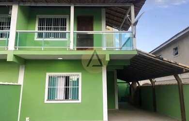 Imagem: A casa possui 2 Dormitórios, 3 Banheiros, 2 Vagas na garagem