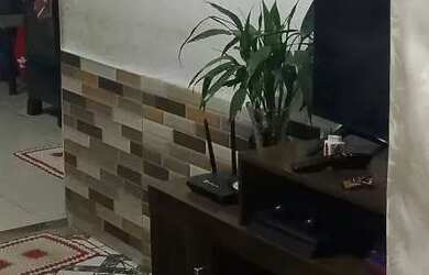 Imagem: A casa possui 4 Dormitórios, 2 Banheiros, 1 Vaga na garagem