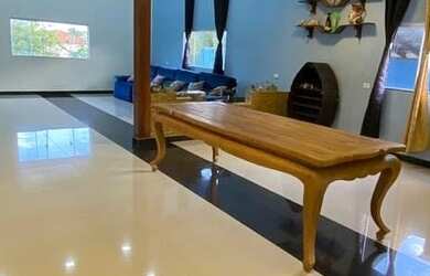 Imagem: A casa possui 4 Dormitórios, 5 Vagas na garagem e está localizado