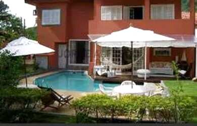 Imagem: A casa em condomínio possui 5 Dormitórios, 5 Banheiros, 3