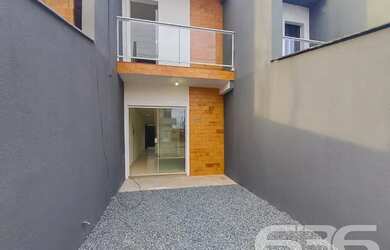 Imagem: A casa possui 2 Dormitórios, 2 Banheiros, 1 Vaga na garagem