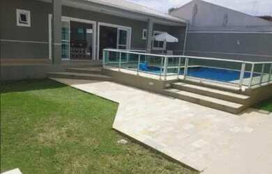 Imagem: A casa possui 3 Dormitórios, 3 Banheiros, 2 Vagas na garagem