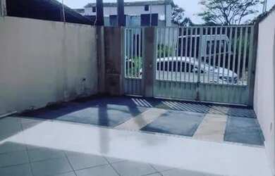 Imagem: A casa possui 3 Dormitórios, 5 Banheiros, 2 Vagas na garagem