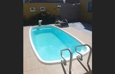 Imagem: A casa possui 4 Dormitórios, 3 Vagas na garagem e está localizado