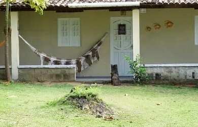 Imagem: A casa possui 2 Dormitórios, 2 Vagas na garagem e está localizado