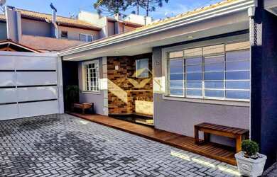 Imagem: A casa possui 3 Dormitórios, 1 Banheiro, 2 Vagas na garagem