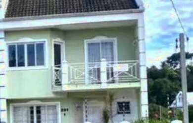 Imagem: A casa possui 4 Dormitórios, 4 Banheiros, 2 Vagas na garagem