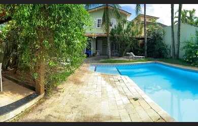 Imagem: A casa em condomínio possui 5 Dormitórios, 5 Banheiros, 4