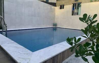 Imagem: A casa possui 3 Dormitórios, 4 Banheiros, 3 Vagas na garagem