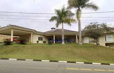 Imagem: A casa em condomínio possui 4 Dormitórios, 5 Banheiros, 5