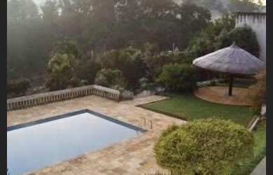 Imagem: A casa em condomínio possui 5 Dormitórios, 4 Banheiros, 5