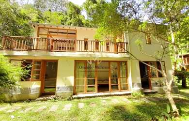 Imagem: A casa possui 3 Dormitórios, 3 Banheiros, 3 Vagas na garagem