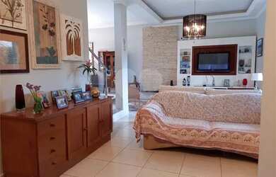 Imagem: A casa em condomínio possui 4 Dormitórios, 4 Banheiros, 4