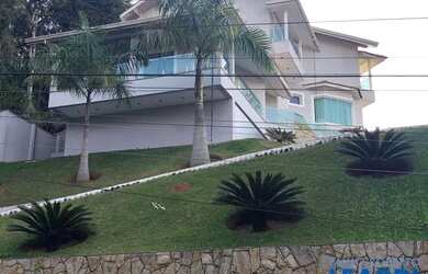 Imagem: A casa em condomínio possui 4 Dormitórios, 5 Banheiros, 4