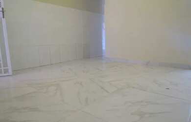 Imagem: A casa possui 4 Dormitórios, 2 Banheiros, 1 Vaga na garagem