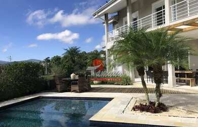 Imagem: A casa em condomínio possui 4 Dormitórios, 5 Banheiros, 5